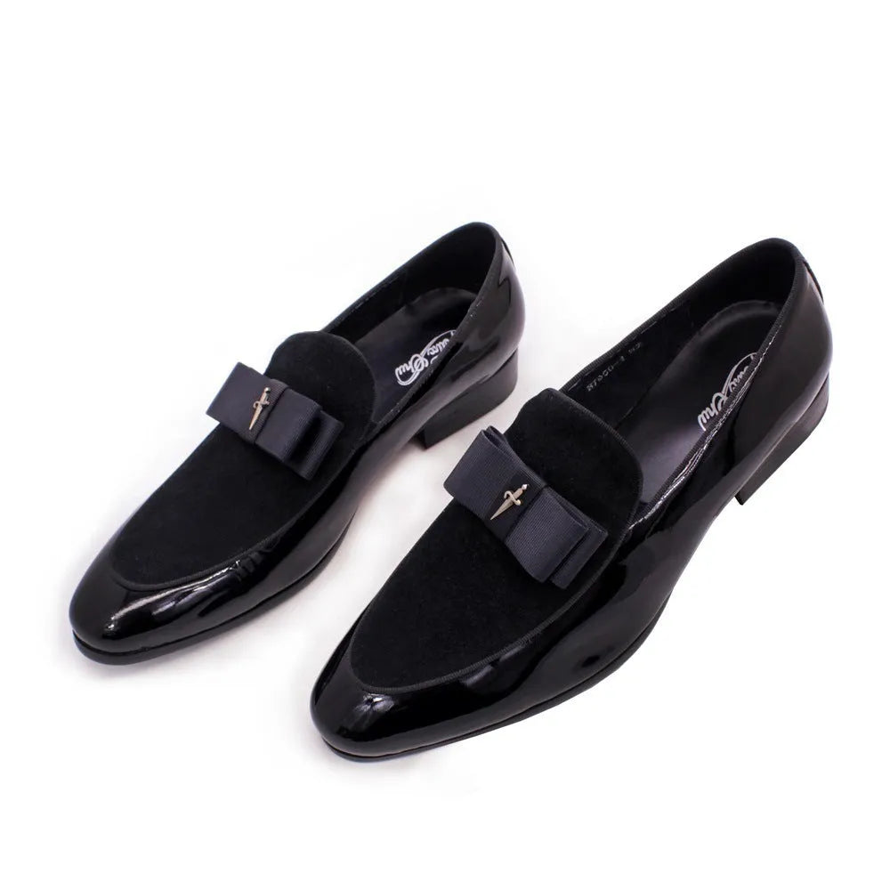 Men's black patent leather low-top shoes with a gold tassel detail and rubber sole.