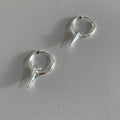 Geometric star shaped ear clips for women with copper construction and platinum electroplated finish