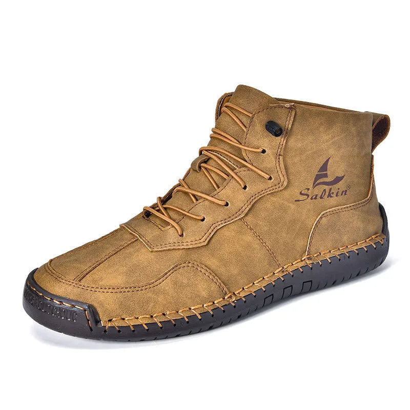 Men's beige retro high-top casual boots with elastic band and round toe on a non-slip rubber sole.