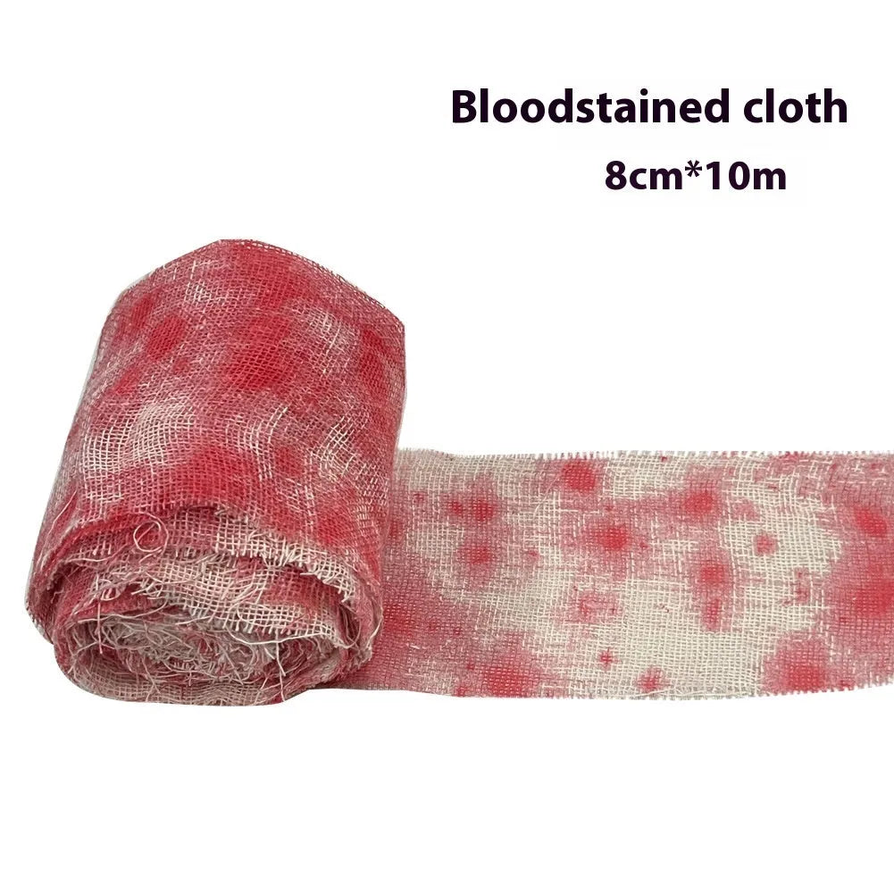 Halloween bloody red and white polyester gauze bandage rolls showing 8cm width, for decorations and costumes.