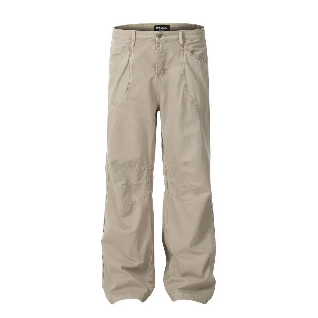 Men's brown loose straight-leg trousers with high waist and wide leg opening on a hanger