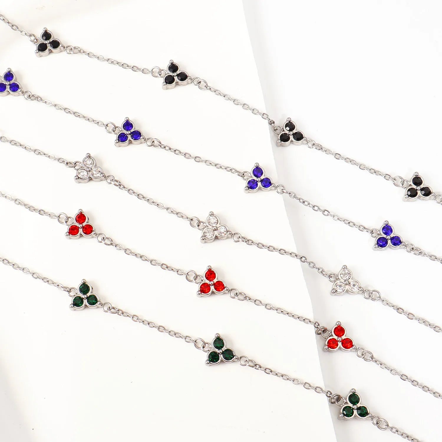 Women's geometric bracelet with triangular diamond cluster in gold or steel stainless steel with coloured stones
