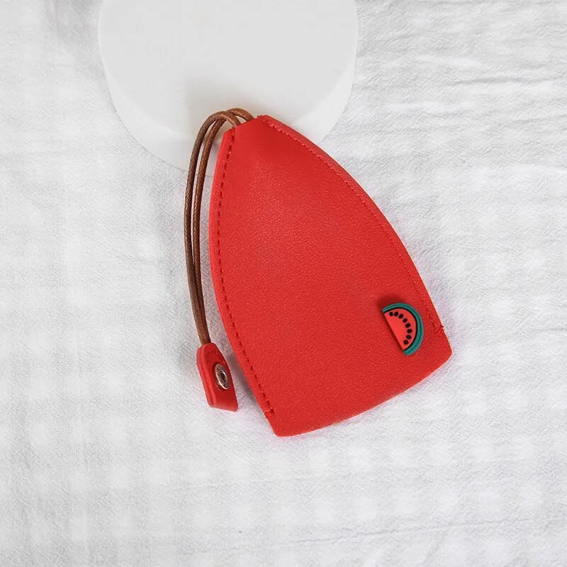 Cartoon pull-out key case in PU leather with colourful design, showing compact 14cm by 7.5cm dimensions