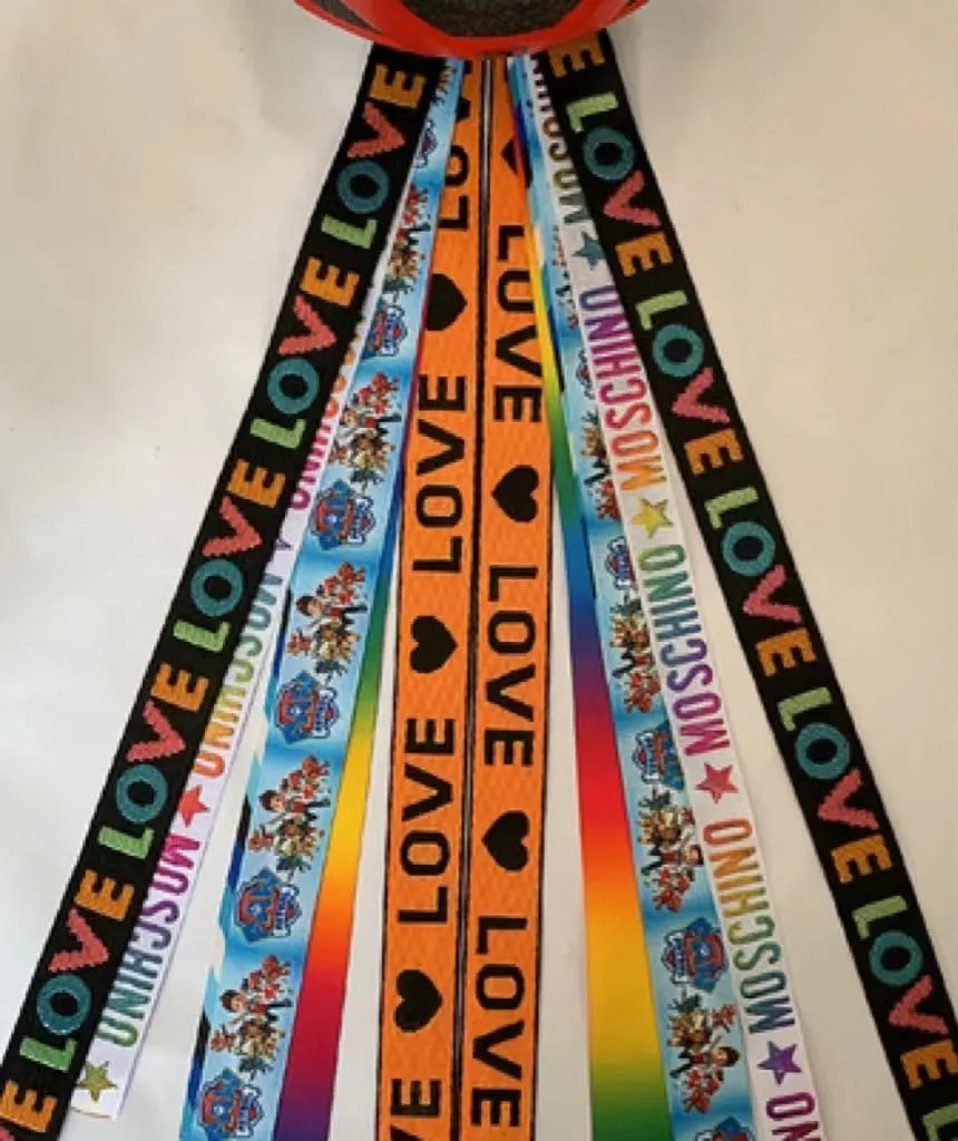 Children's decorative helmet streamer ribbon in multiple colours for roller skating and skiing safety gear.