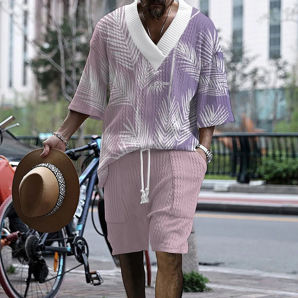 Men's knitted short-sleeved top and matching shorts in a solid colour, showing relaxed drop-shoulder fit.