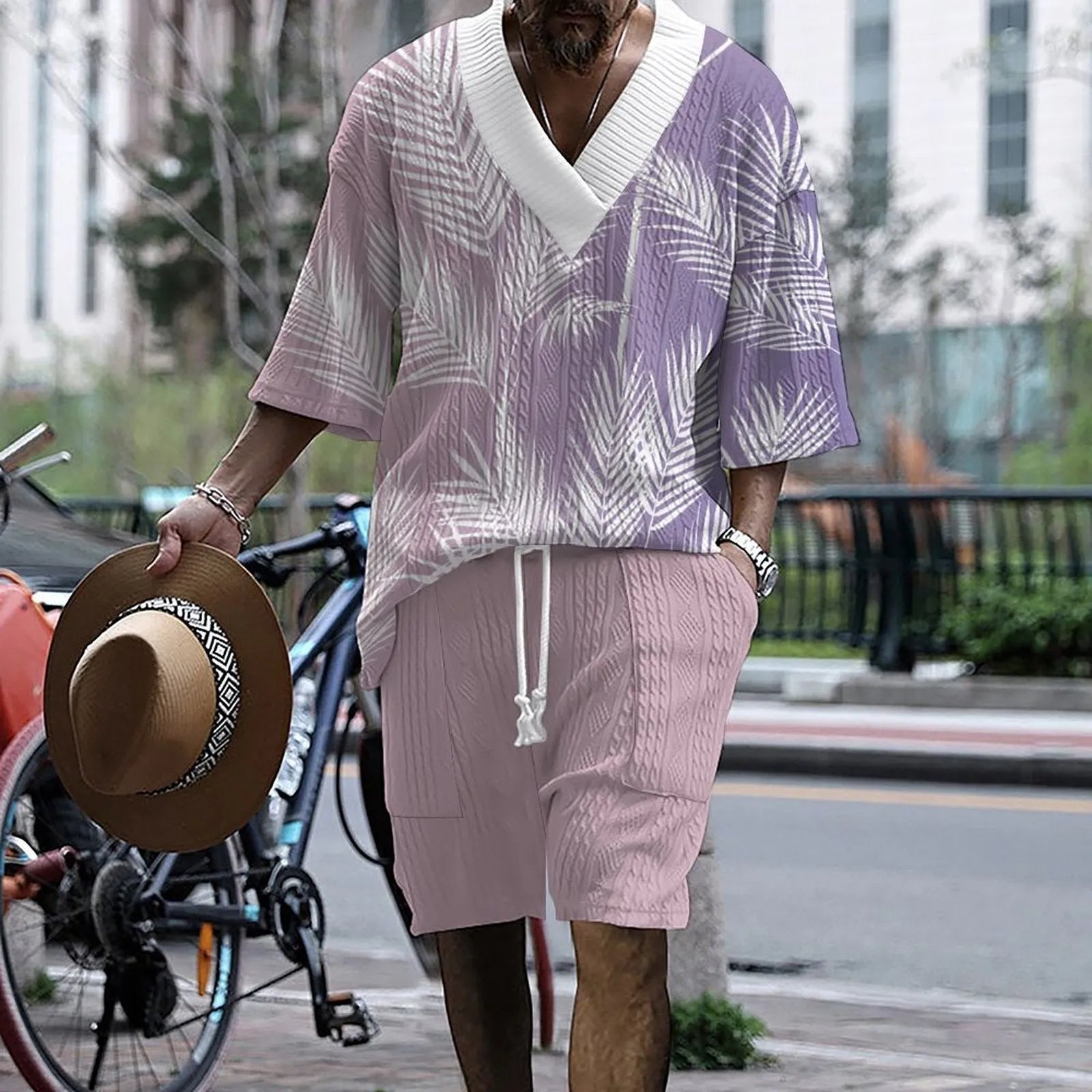 Men's knitted short-sleeved top and matching shorts in a solid colour, showing relaxed drop-shoulder fit.