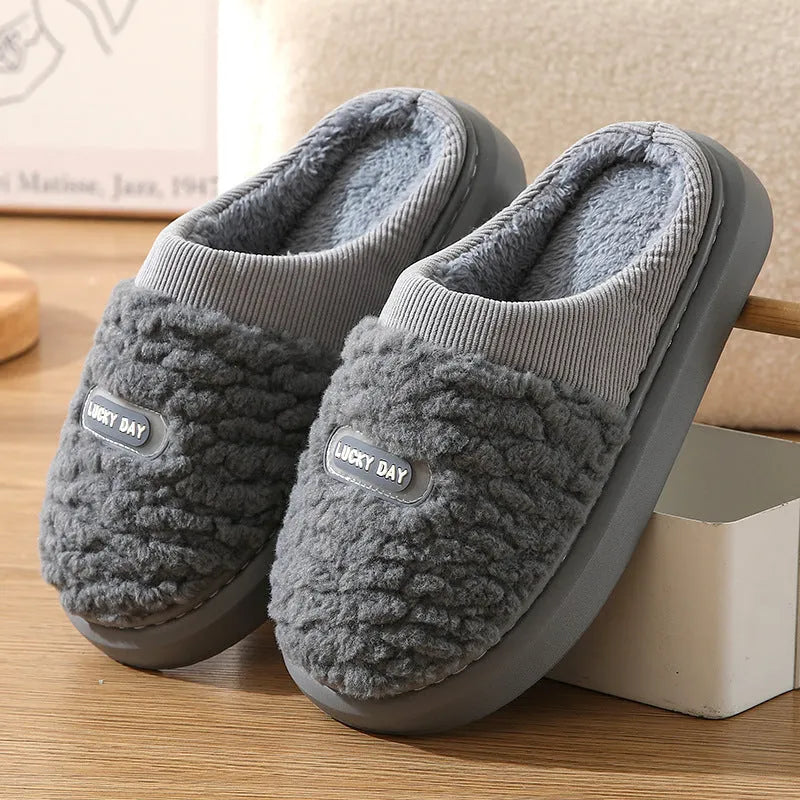 Men's grey and brown plaid rabbit hair slippers with thick EVA sole and wool lining.