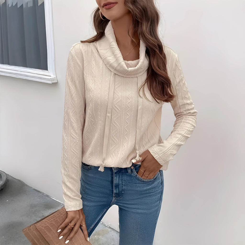 Apricot coloured hooded pullover sweater with long sleeves and drawstring