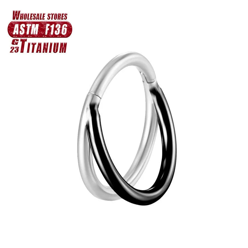 Titanium alloy fork nose ring for body piercing in silver colour on a grey background.