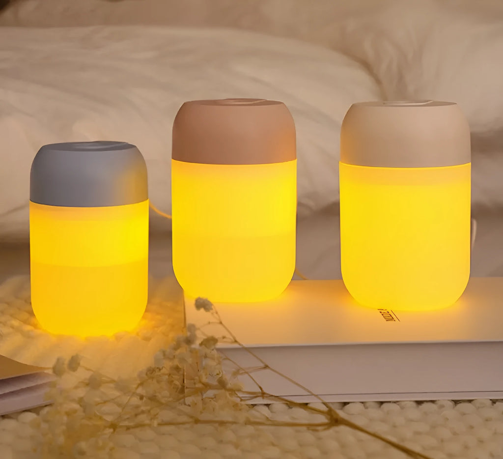 White cylindrical mini humidifier with USB port and aromatherapy function for small-space moisture control