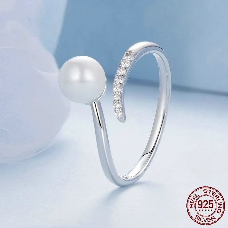 S925 sterling silver adjustable ring with natural shell pearls and opening loop design