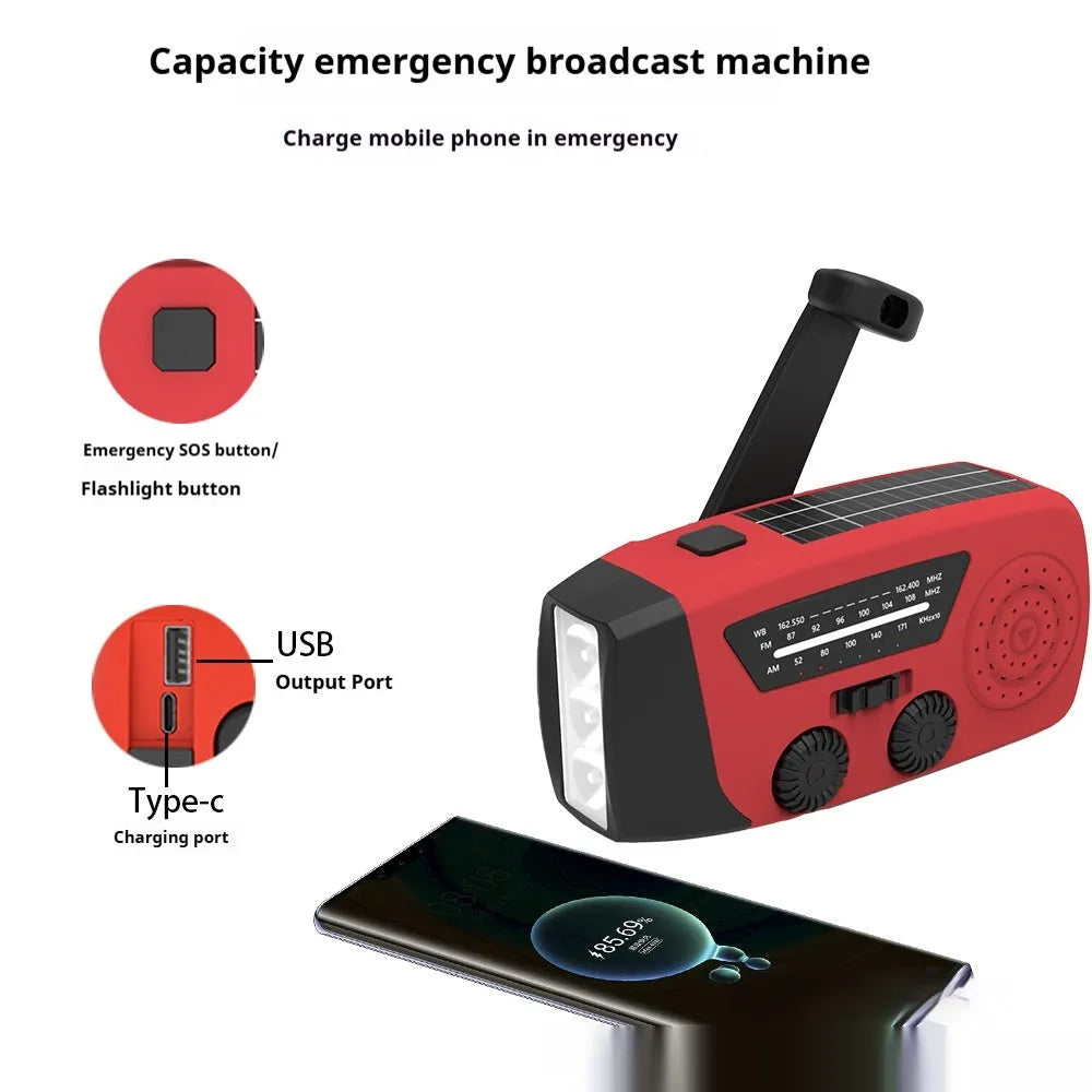 Red rechargeable hand radio torch with USB port and wrist strap on a white background.