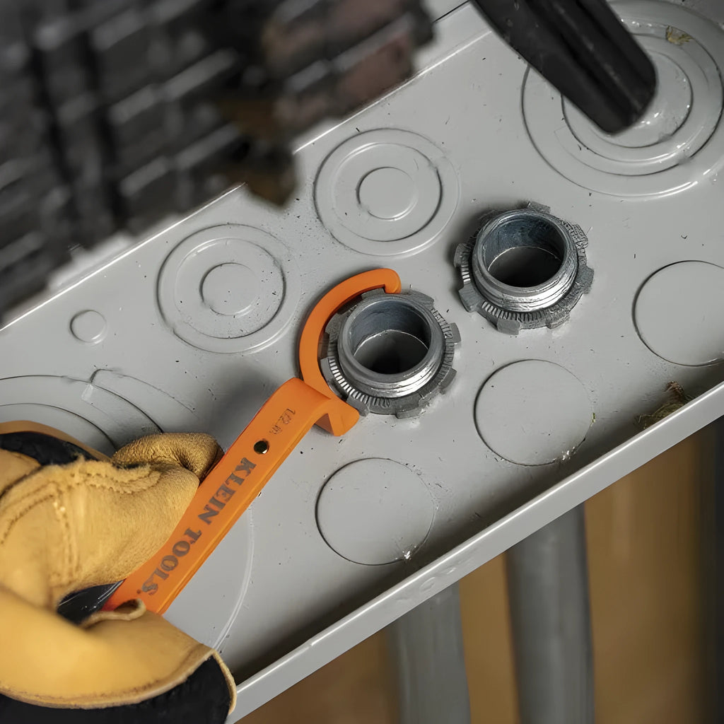 Three colour-coded crescent wrenches with magnetic suction bases: orange, grey and black adjustable spanners