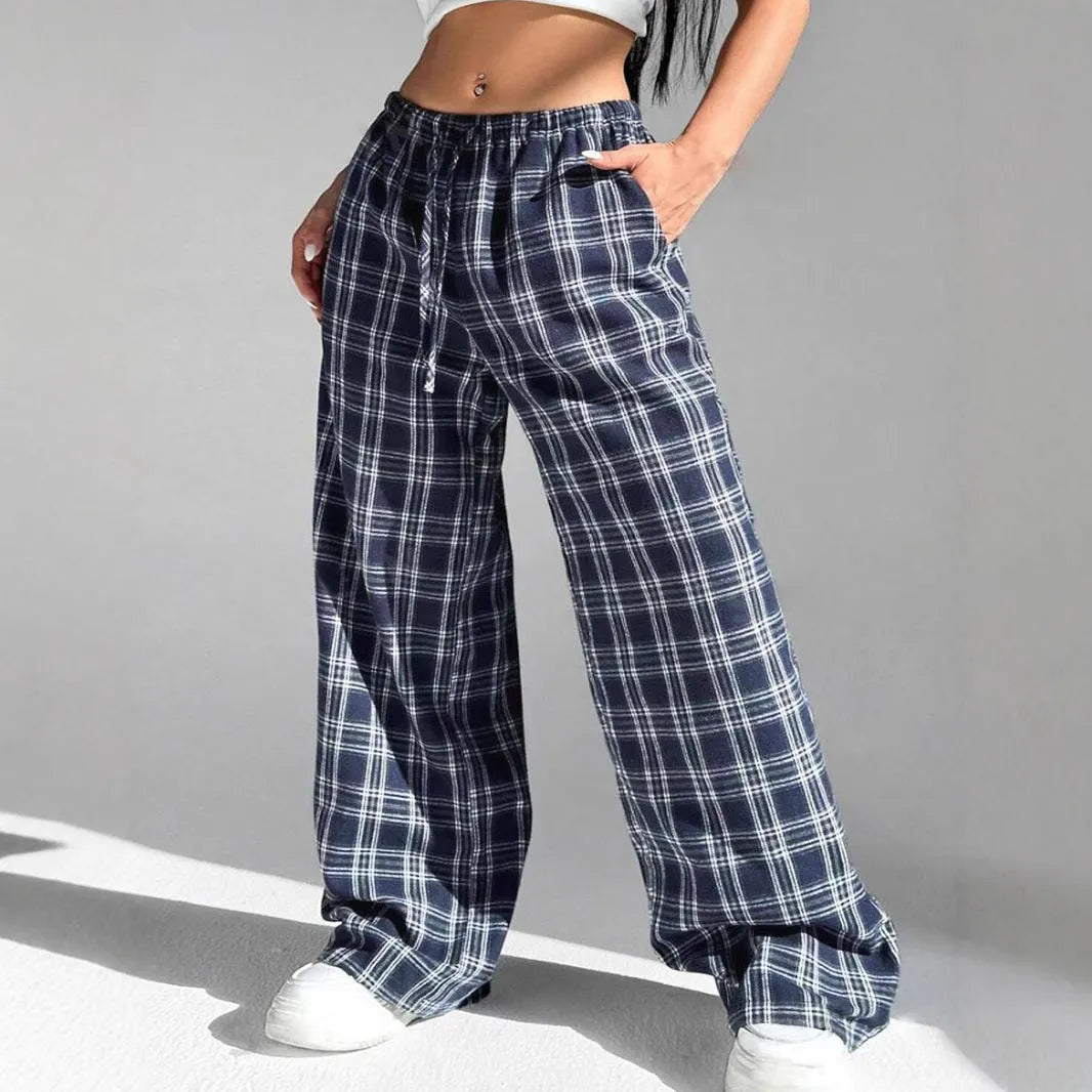 Women's loose fit plaid trousers with drawstring waist and side pockets in red and blue colours