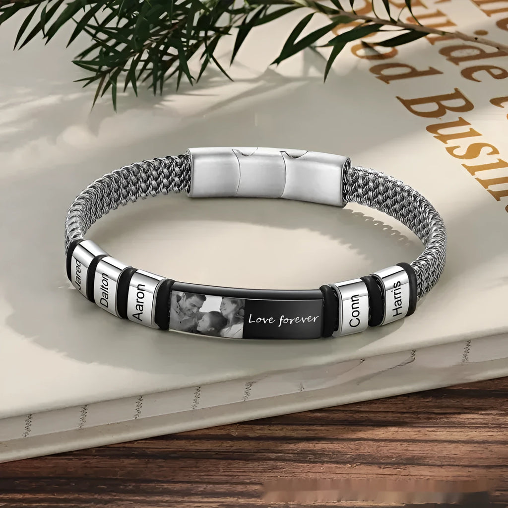 Men's titanium steel rope bracelet with heart-shaped lettering charm on wrist