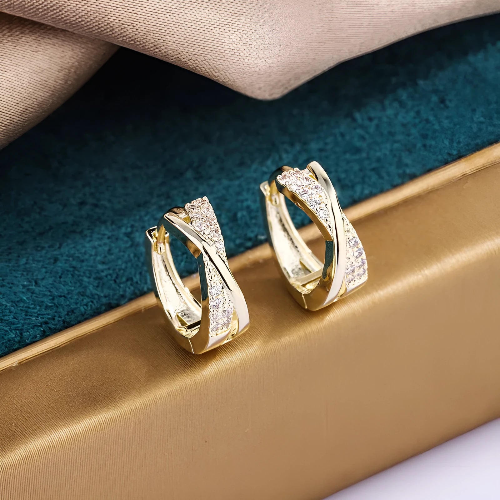 Geometric copper drop earrings with zircon accents and 14K yellow finish