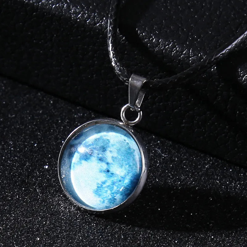 Alloy necklace with luminous glass pendant showing Christmas moon night sky and constellation design.