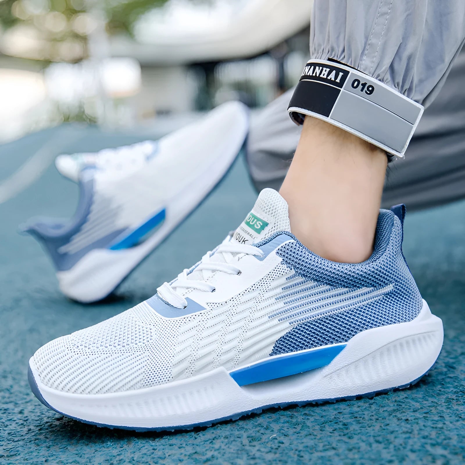 Men's blue grey green breathable mesh casual shoes with round toe and plastic sole.