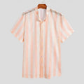 Pink men's loose-fit waffle knit short sleeve cardigan shirt on a hanger