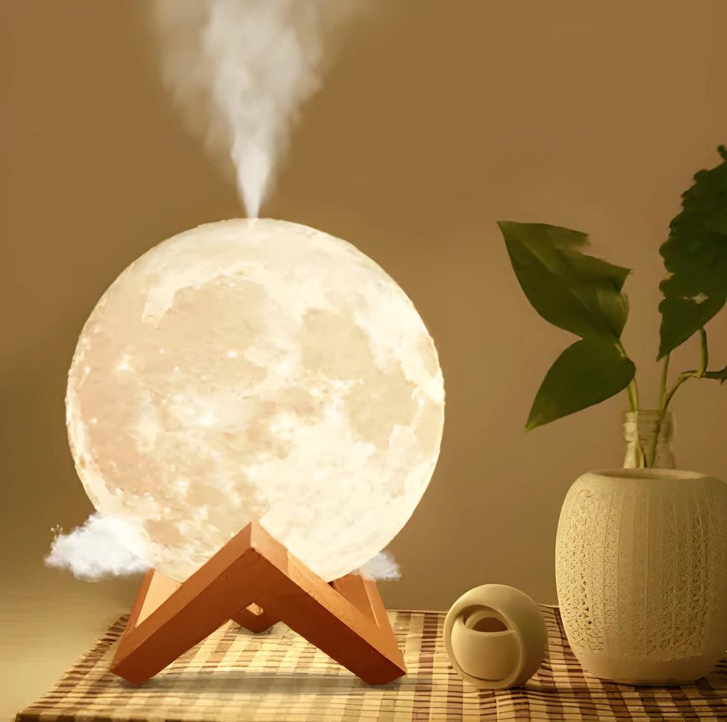 Lunar sphere humidifier and night light in wood finish with white LED light on a bedside table
