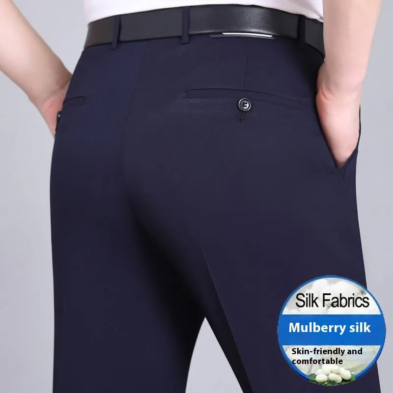 Men's straight-leg mulberry silk blend dress trousers in black on a hanger