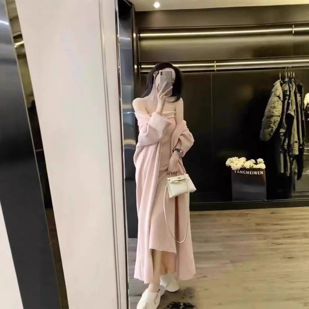 Women's grey knitted cardigan dress suit with matching coat, showing flocked pattern detail.
