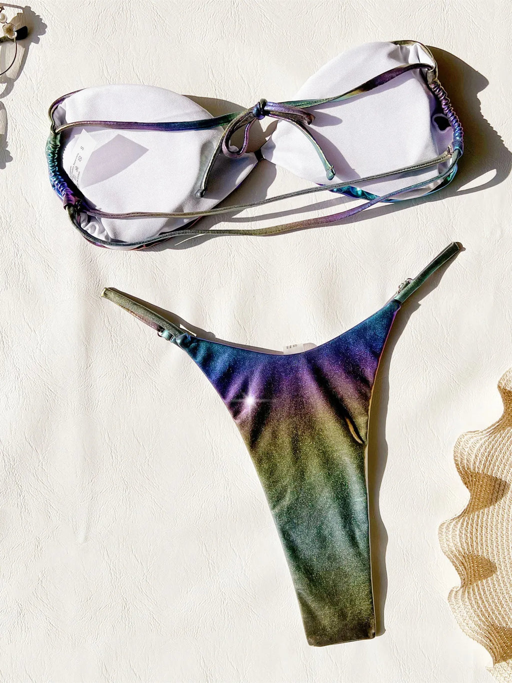 Women's gradient purple bikini swimsuit set on a mannequin.