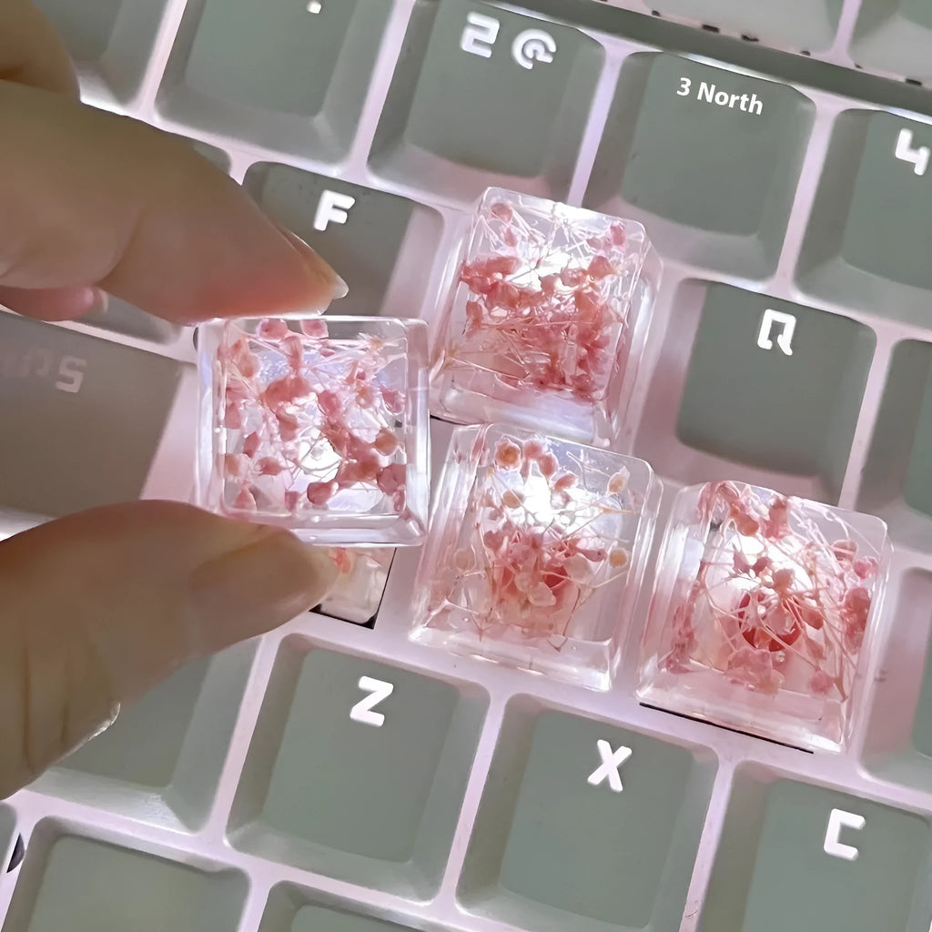 Resin starry sky artisan keycap in green, pink, red, or violet for mechanical keyboard customisation.