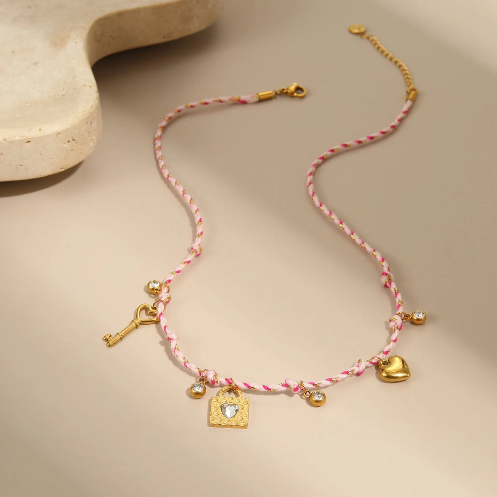 Handmade braided rope necklace and bracelet set with heart pendant in stainless steel