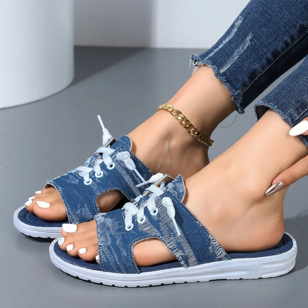 Blue Roman style women's canvas slippers with cloth lining and rubber soles