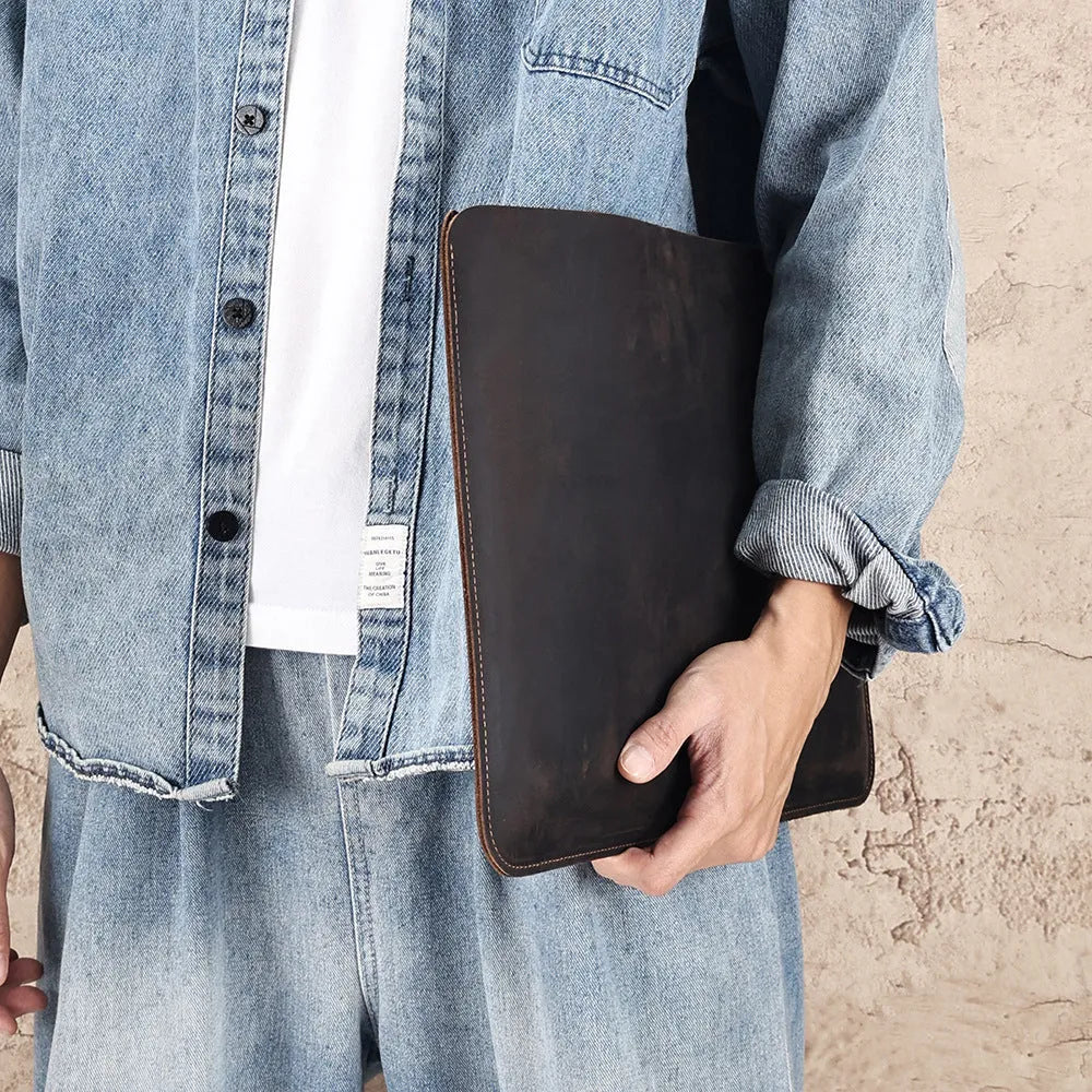 Men's brown crazy horse leather horizontal computer liner bag showing compartments and wear-resistant construction