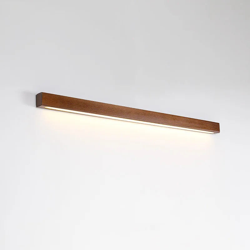 Modern walnut colour wood and acrylic strip wall lamp available in 60cm, 80cm, and 120cm lengths with LED lighting.