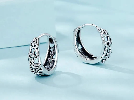 Sterling silver retro butterfly earrings with zircon detailing and hollow design
