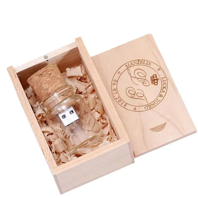Transparent glass bottle USB flash drive with a wooden stopper cap, 60mm long.