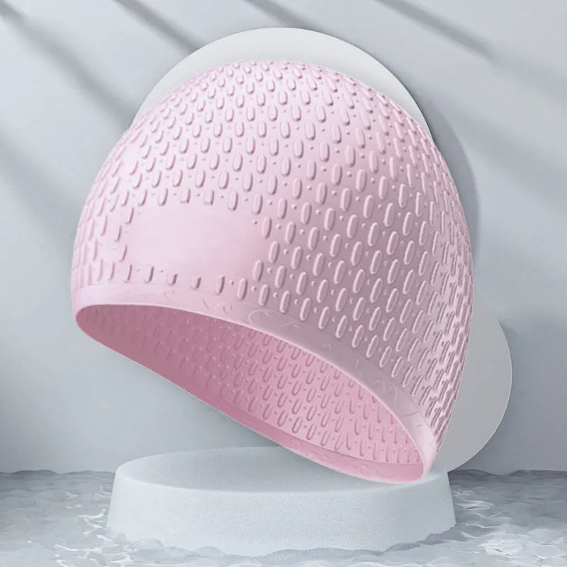 Silicone water drop design swimming cap for adults shown in various colours.