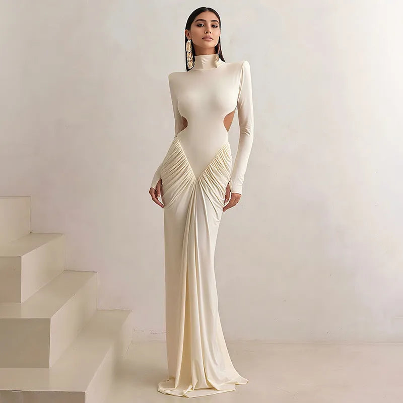 Long sleeve slim fit pleated backless dress with a high collar in a solid colour.