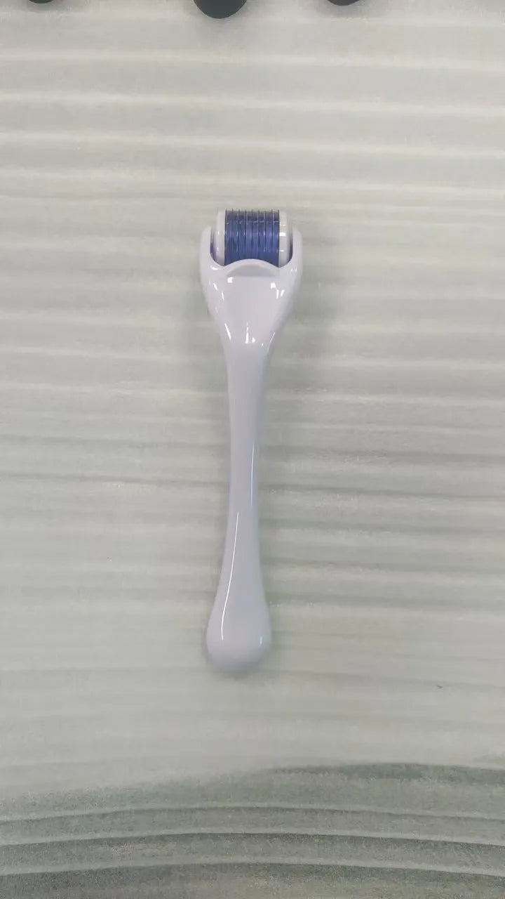 540 micro needle derma roller showing handle and needle wheel in a selected colour