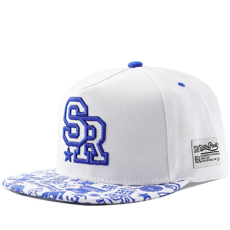 Cotton baseball hat with embroidered letters on a dome crown, shown in black and white.