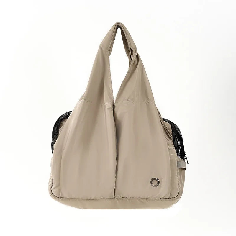 Apricot cloth pet handbag measuring 41x16x28cm with carry handles for outdoor summer use