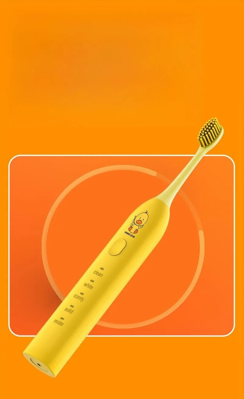 Small yellow duck electric toothbrush with soft bristles and USB charging in green pink and yellow colours