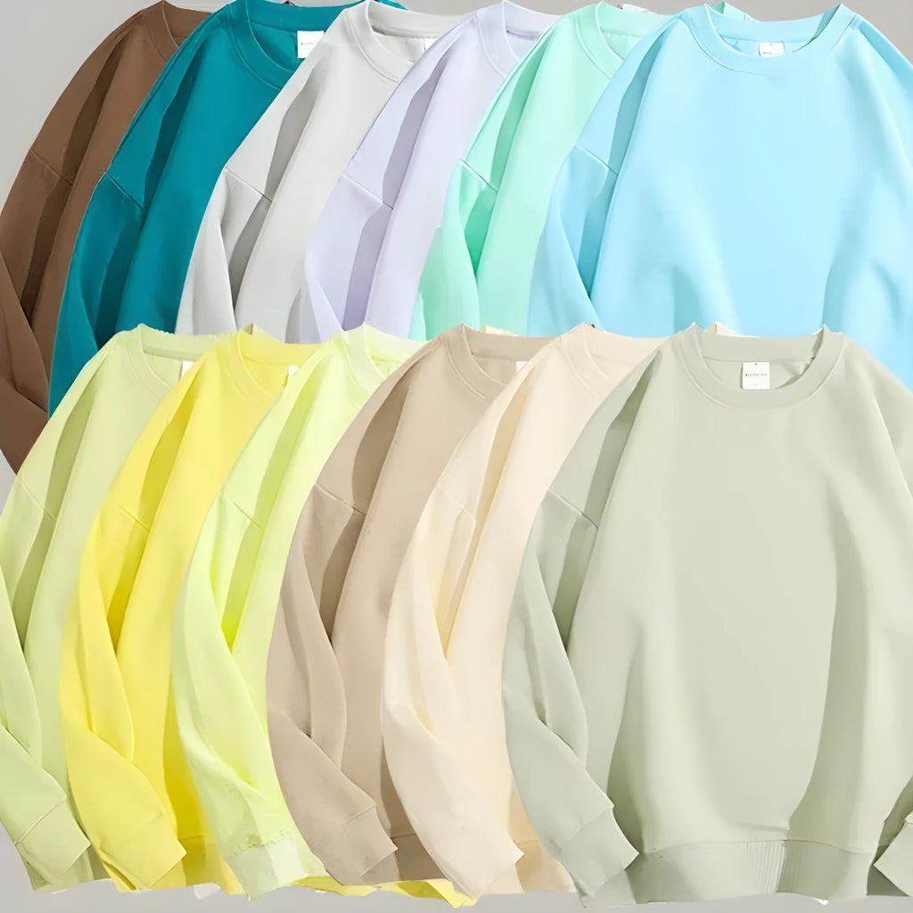Women's loose fit cotton off shoulder sweater in a solid colour with round neck and long sleeves.