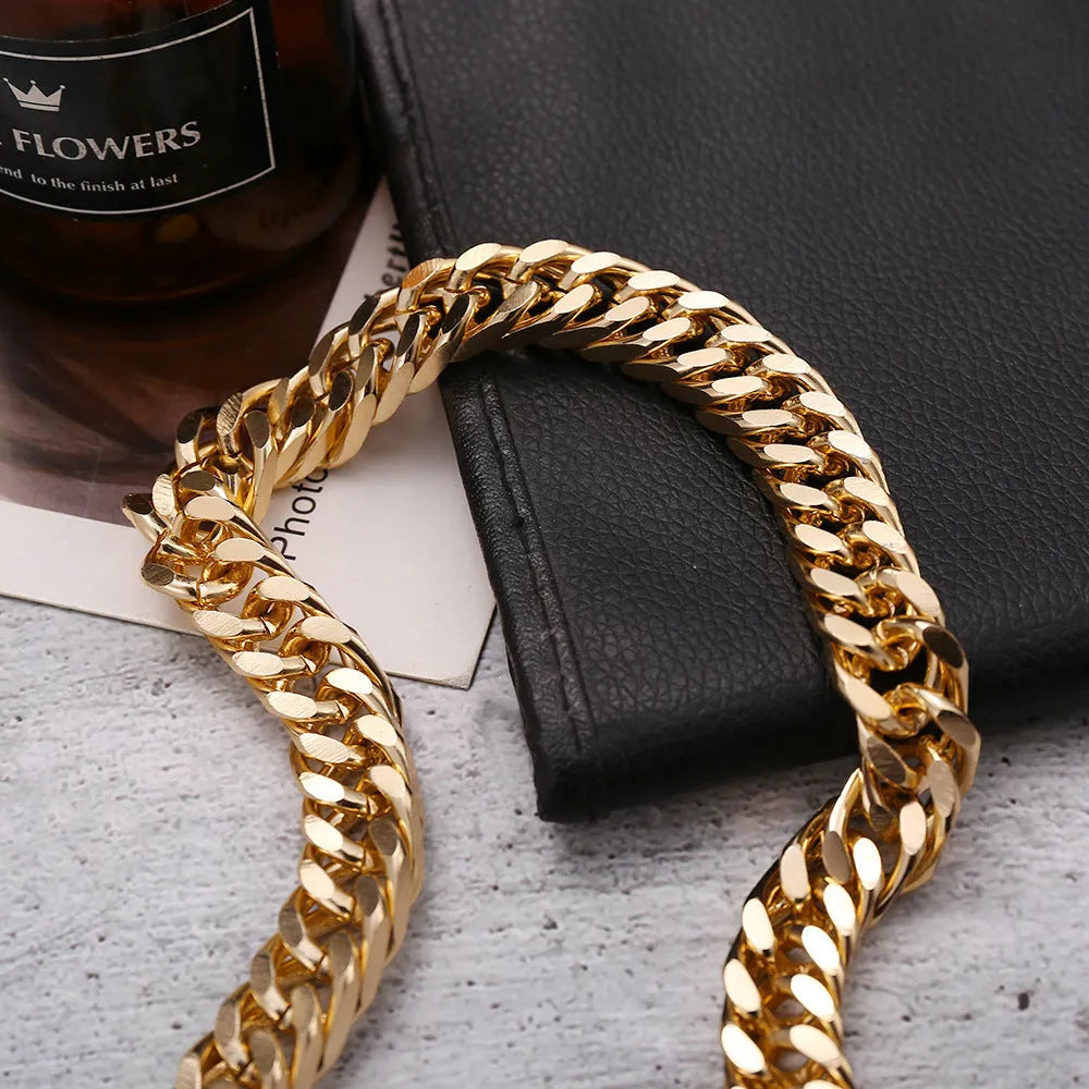 Women's thick chain necklace in dense gold colour measuring 32cm length with simple solid colour design