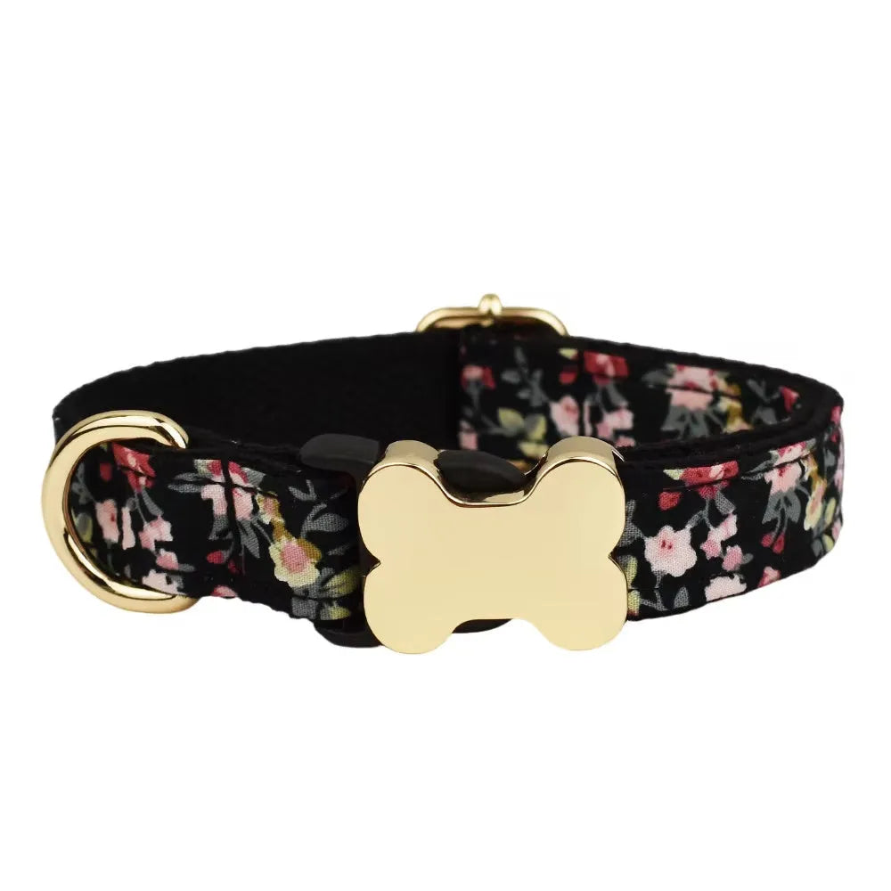 Nylon dog collar with printed grid pattern and a bone-shaped metal buckle in a selected colour.