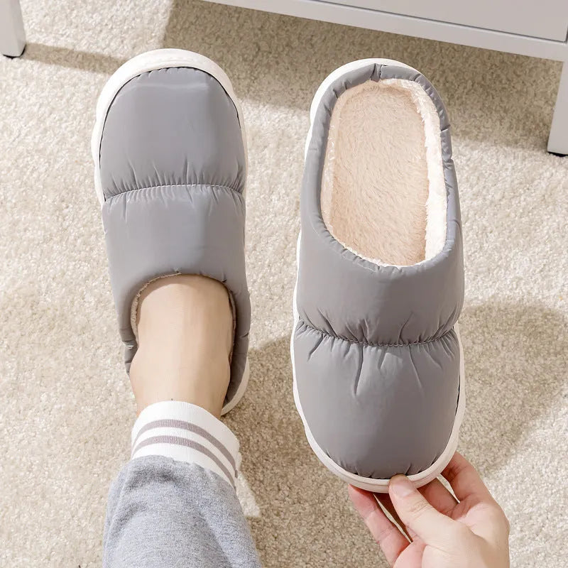 Down cotton indoor slippers with artificial leather upper and rubber sole in various colours