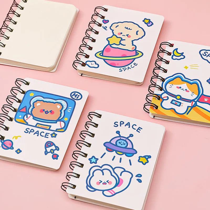 Astronaut themed pocket flipper notebook measuring 10.5 by 8 centimetres