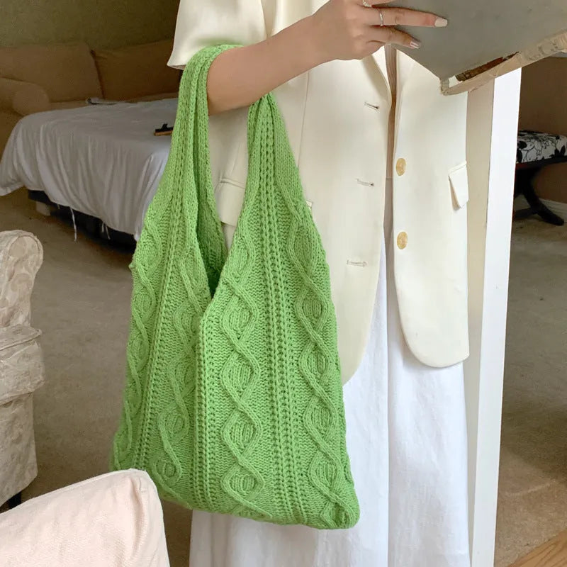 Retro hollow knitted shoulder tote bag in polyester with crochet design showing double straps and large capacity