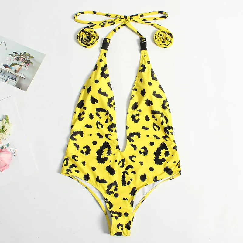 Women's leopard print one-piece swimsuit with buckle bandage detailing and backless design