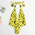 Women's leopard print one-piece swimsuit with buckle bandage detailing and backless design