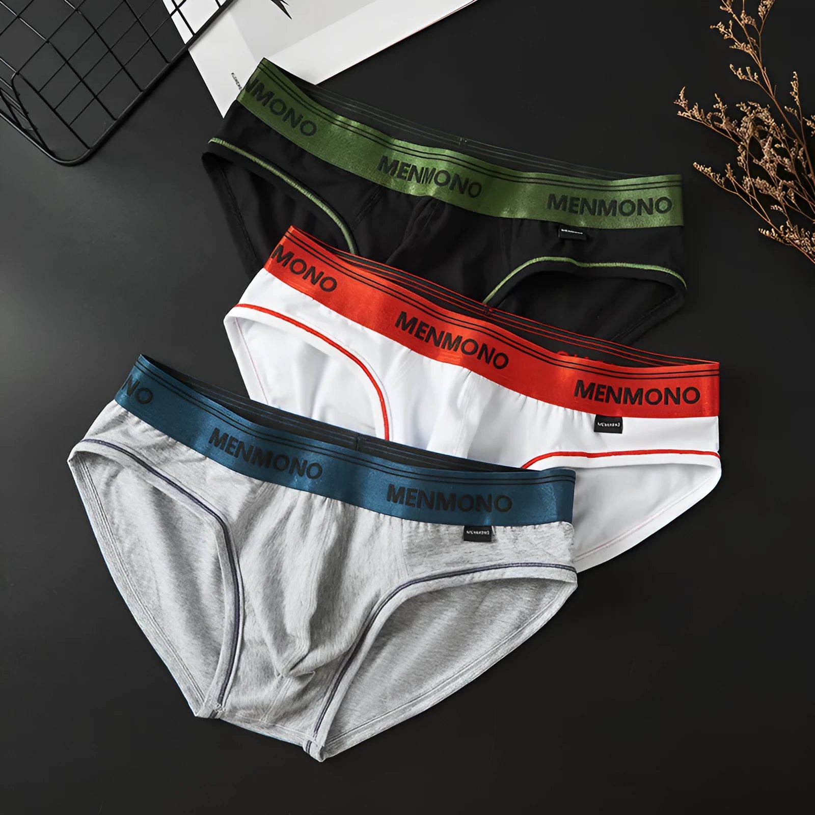 Men's low waist cotton blend briefs in a grey and blue colour block combination.