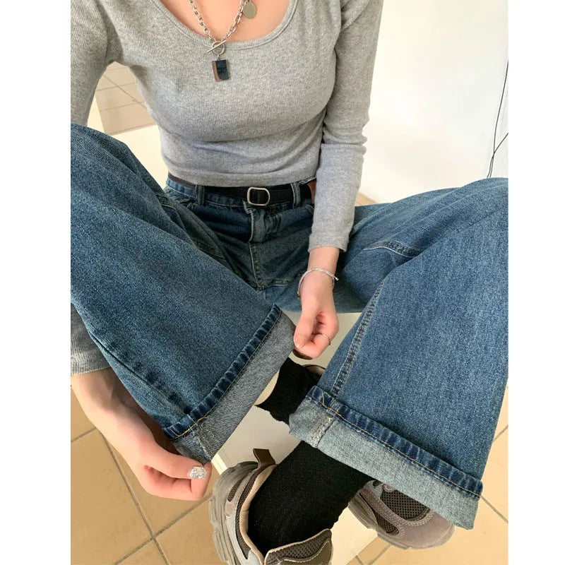 Women's high-waist straight leg jeans in retro blue denim showing three length variations